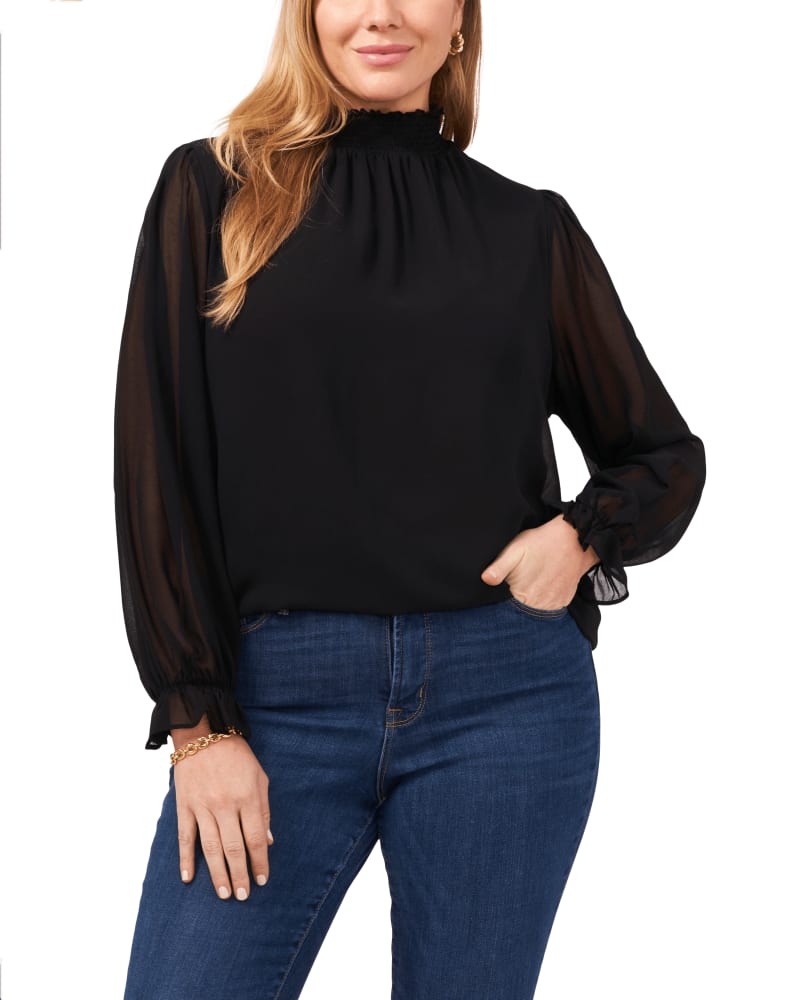 Front of a model wearing a size 0X Kiana Smock Neck Top in RICH BLACK-062 by 1.State. | dia_product_style_image_id:262413